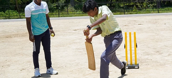 Students playing Cricket-Ela Green School